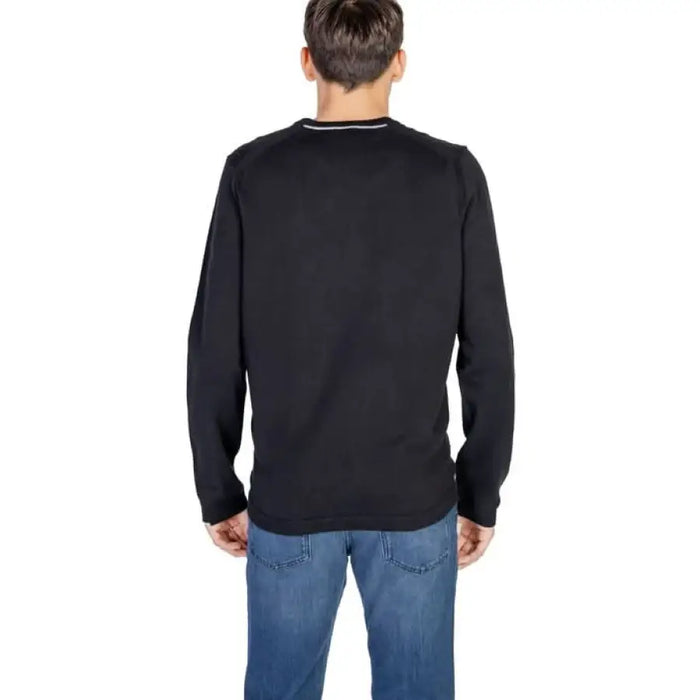 Black long-sleeve crewneck sweater viewed from the back by Boss Men Knitwear