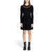 Black long-sleeved knit dress with sheer neckline and flared skirt by Morgan De Toi