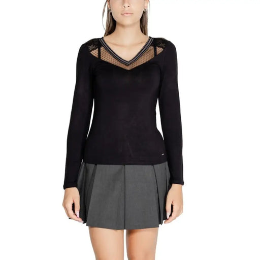 Black long-sleeved top with mesh neckline detail by Morgan De Toi for women