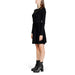 Black long-sleeved mini dress with chunky ankle boots by Morgan De Toi for women