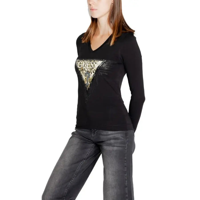 Black long-sleeved Guess shirt with gold triangular logo on chest for women