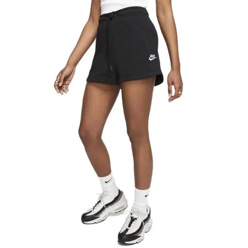 Black Nike athletic shorts modeled by a dark-skinned person for Nike Women Short