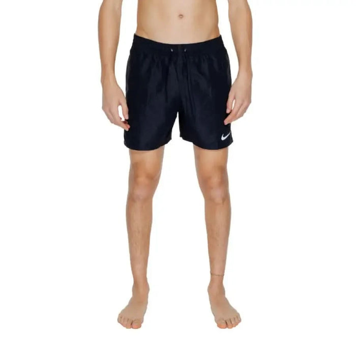 Person wearing Nike Swim - Nike Swim Men Swimwear black Nike swim shorts