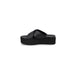 Calvin Klein black platform slide sandal with thick sole and crossed upper straps for women