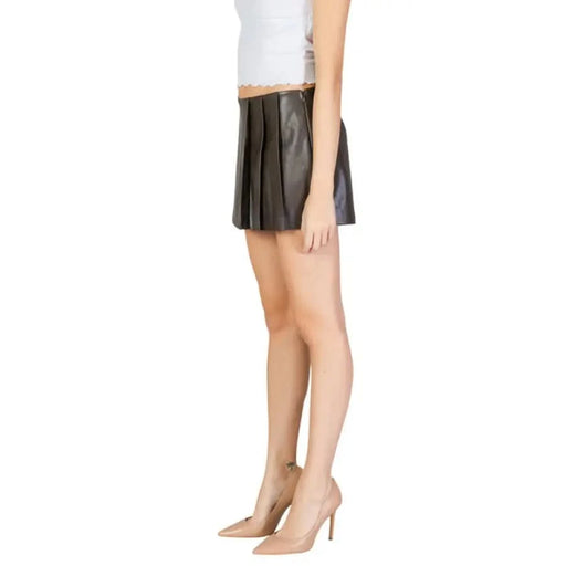 Black pleated leather mini skirt with nude heels from Only Women Short collection