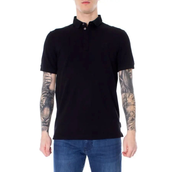 Black short sleeve polo shirt worn by tattooed person from Armani Exchange collection