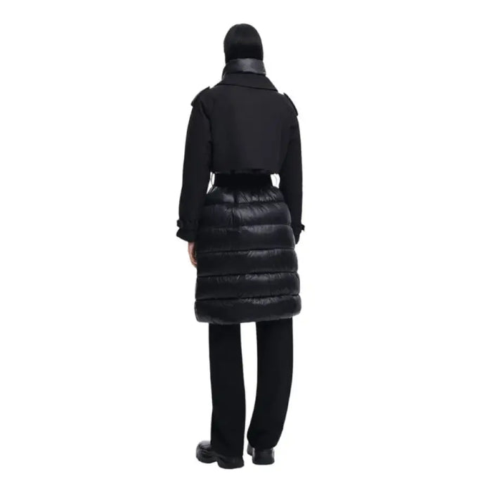 Black puffer coat with belted waist styled over dark pants for Desigual Women Jacket