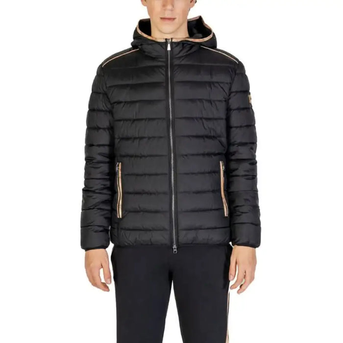 Black quilted puffer jacket with hood and gold zipper accents by Alviero Martini Prima Classe