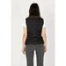 Ea7 Women Gilet - Black quilted vest over a white t-shirt