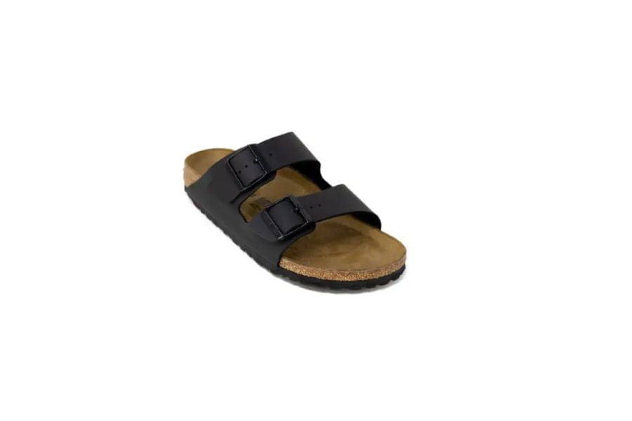 Black sandal with adjustable straps and contoured footbed for summer outfit ideas.