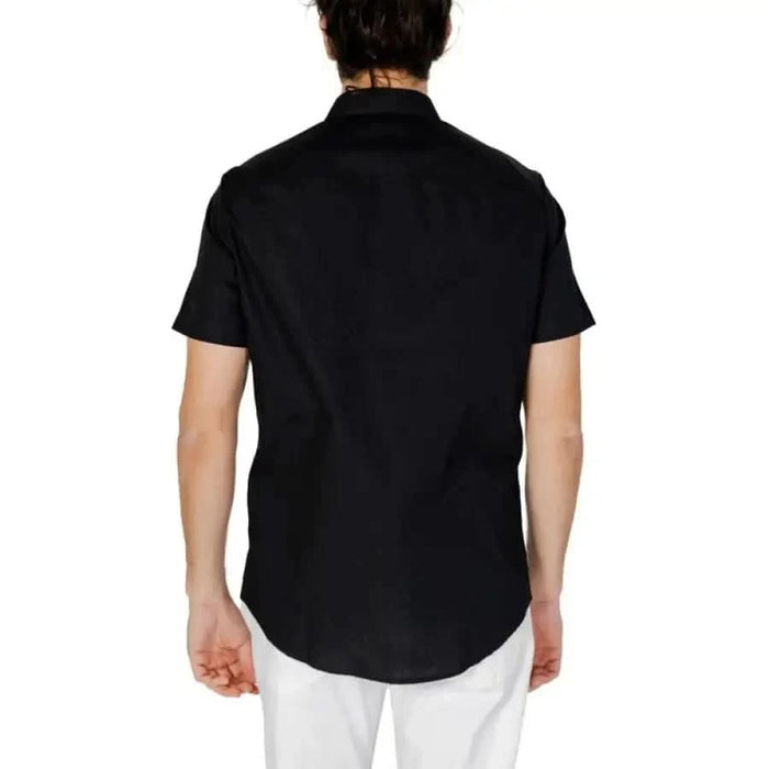 Black short-sleeved button-up shirt from the back by Armani Exchange for men