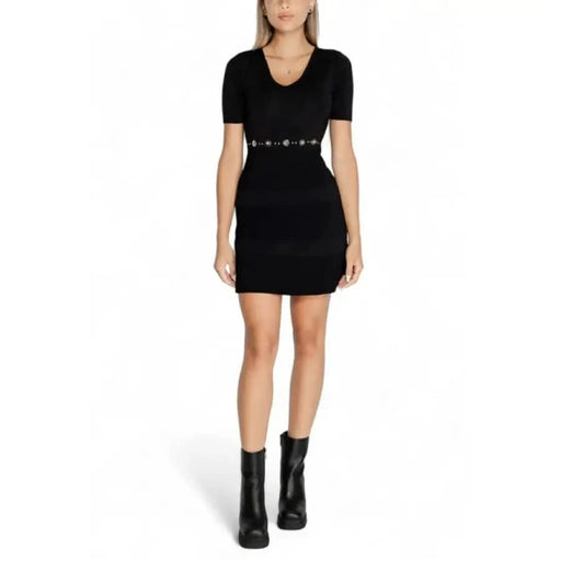 Black short-sleeved mini dress with belted waist and V-neckline by Morgan De Toi