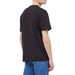 Person wearing Black T-Shirt with Blue Jeans, Tommy Hilfiger Jeans Men T-Shirt product display