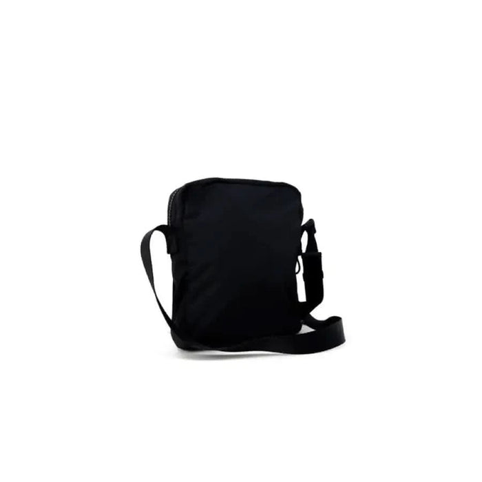 Black shoulder bag with zippered compartment and adjustable strap by Tommy Hilfiger Jeans