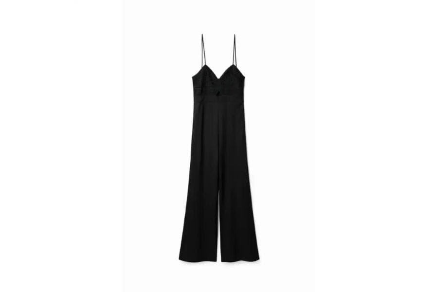 Black spaghetti-strap jumpsuit with wide-leg pants for stylish holiday outfits.