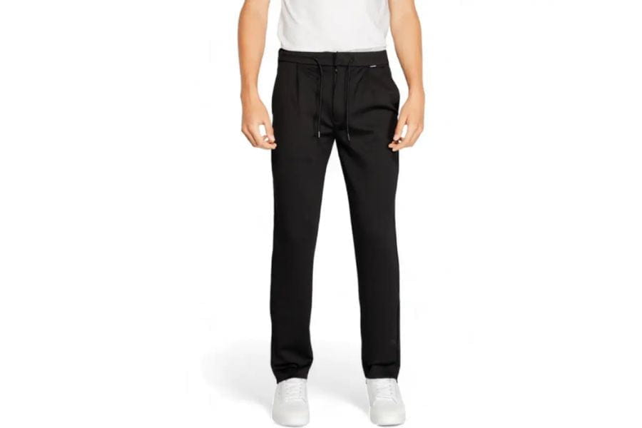 Black straight-leg pants with pockets ideal for a smart casual men summer wardrobe.