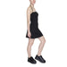 Black strapless mini dress paired with black platform sneakers from Tommy Hilfiger Jeans