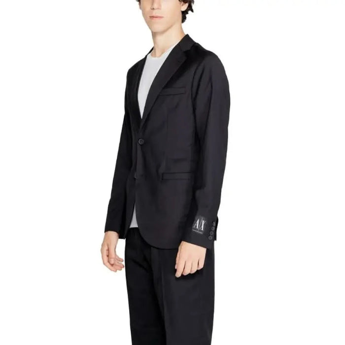 Black suit jacket over light gray t-shirt from Armani Exchange Men Blazer