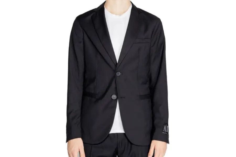 Black suit jacket with two buttons over a white shirt for smart casual men summer style.