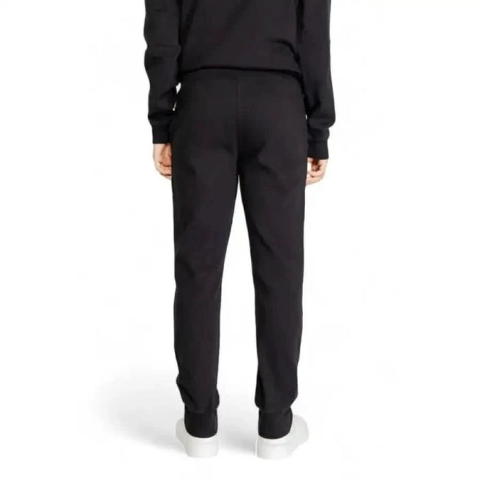 Black Napapijri men trousers or joggers viewed from behind, showcasing style and comfort