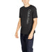 Calvin Klein Sport Men T-Shirt featuring black fabric with vertical Calvin Klein print