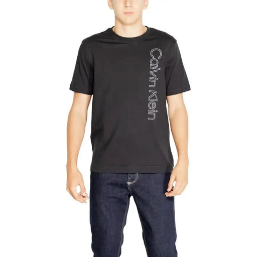 Black Calvin Klein Sport T-shirt with vertical gray ’Calvin’ print on the side