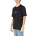 Black Calvin Klein Jeans Men T-Shirt featuring a small monochrome logo on the chest