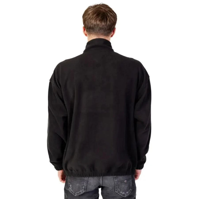 Tommy Hilfiger Jeans Men Black Turtleneck Jacket viewed from behind