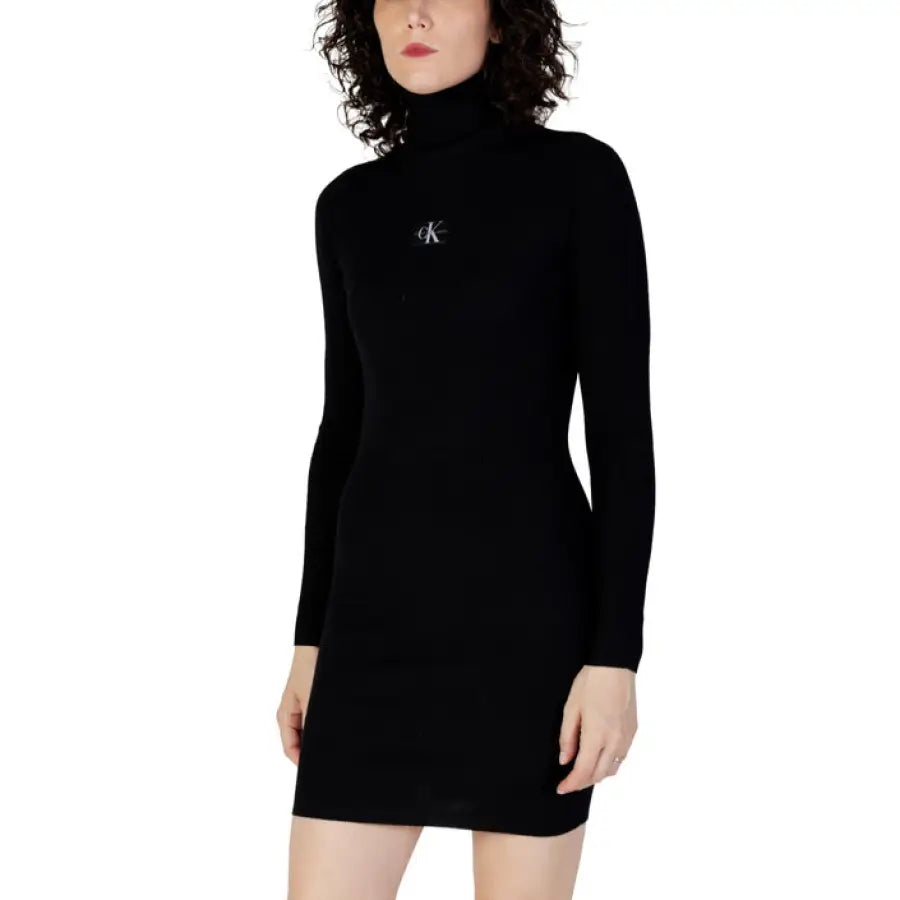 Calvin Klein Jeans Women’s black turtleneck mini dress with long sleeves and a CK logo