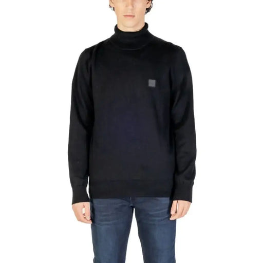 Black turtleneck sweater with logo patch from Boss Men Knitwear collection