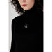 Black turtleneck sweater featuring Calvin Klein logo from Calvin Klein Jeans Women Dress line