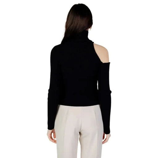 Black turtleneck sweater with one shoulder cut out from Hanny Deep Women Knitwear