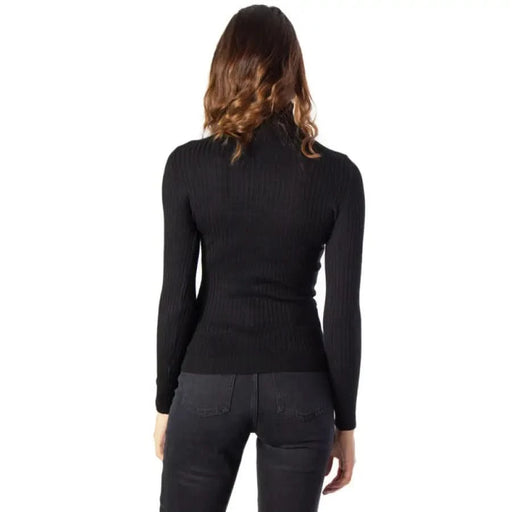 Black turtleneck sweater model with long wavy ombre hair from Only Women’s Knitwear