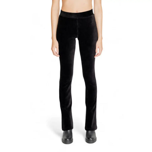 Black velvet flared yoga pants on a model from Street One Women Trousers collection