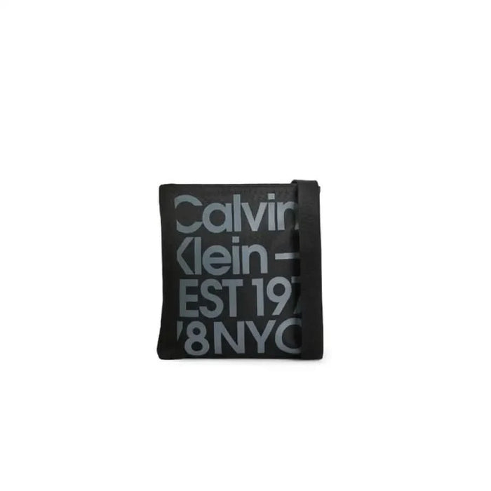 Black Calvin Klein wallet featuring distinct branding in a stylish men’s bag collection