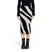 Black and white zebra-striped midi skirt paired with a black top and ankle boots