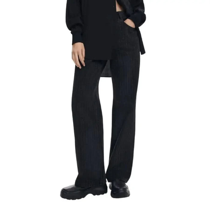 Black wide-leg trousers with chunky platform boots from Desigual Women Jeans collection