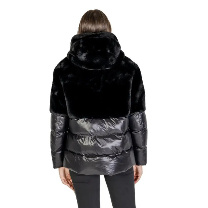 Black winter jacket with faux fur collar and quilted puffer design by Blauer