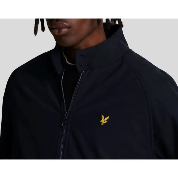 Black zip-up jacket featuring gold Lyle & Scott eagle logo on the chest, Men Blazer