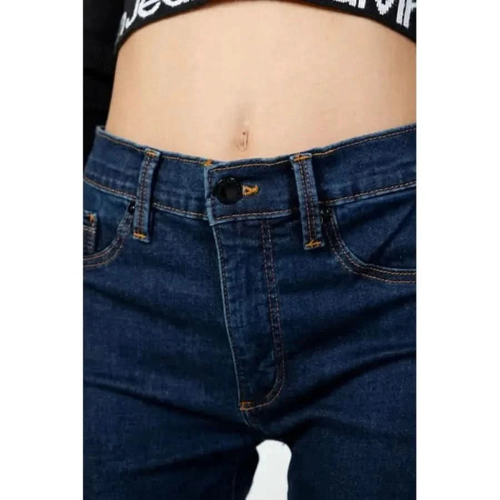 Calvin Klein women’s blue denim jeans with visible waistband and button closure