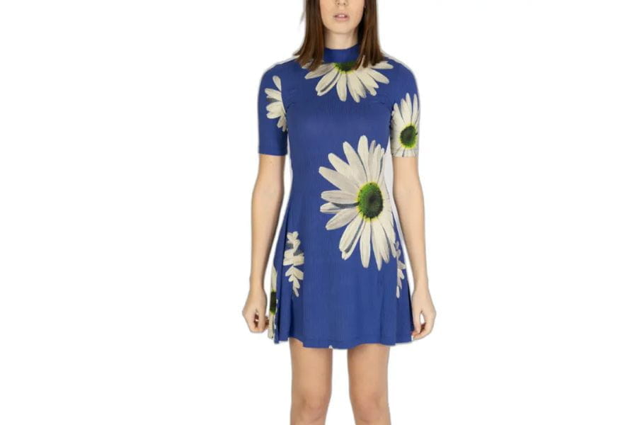 Blue dress with white daisy print, ideal for stylish summer work outfits.