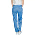 Blue linen chambray trousers paired with white sneakers from Street One Women Trousers