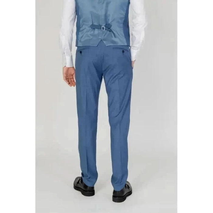 Antony Morato blue suit and trousers with white shirt and black shoes.