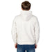 Boy in white hoodie showcasing U.S. Polo Assn. blazer for urban city fashion