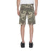 Boy in U.S. Polo Assn white t-shirt and camo shorts for urban city fashion