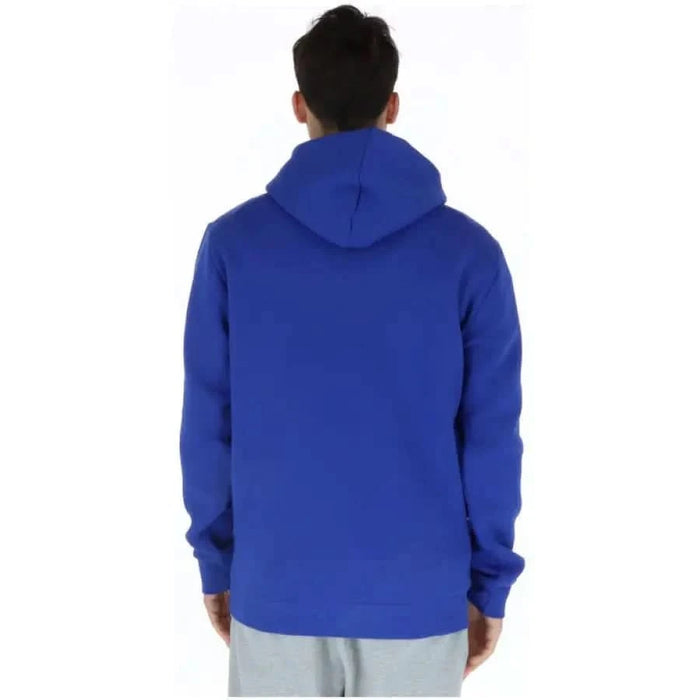 Adidas Men Sweatshirts - Bright blue hooded sweatshirt worn by person viewed from behind