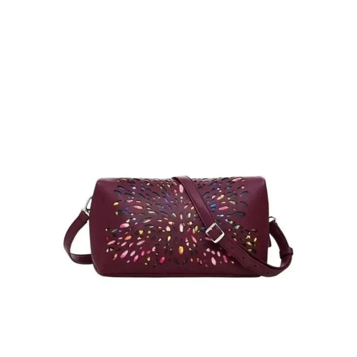 Burgundy leather crossbody bag with colorful perforated design by Desigual