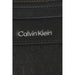 Calvin Klein logo on black textured surface of Calvin Klein Men Bag