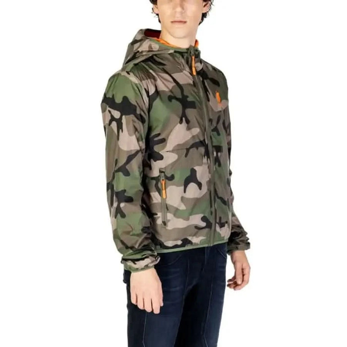 Camouflage hooded windbreaker jacket paired with dark jeans from U.S. Polo Assn