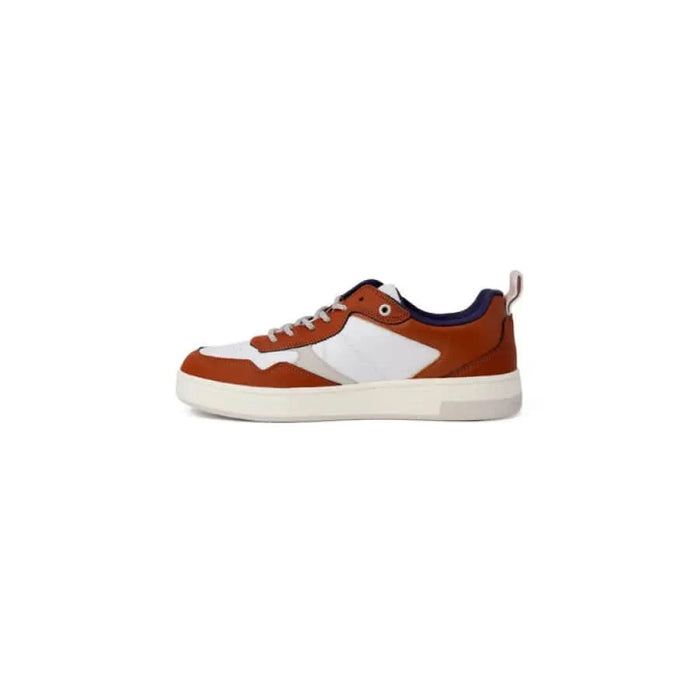 Casual sneaker featuring white and rust-colored leather panels with blue interior lining